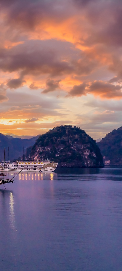 a scenic sunset cruise in Ha Long Bay, Vietnam