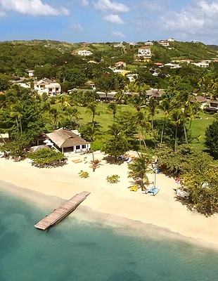 an aerial view of the Calabash Hotel in Grenada, located on the secluded L'Anse Aux Epines beach