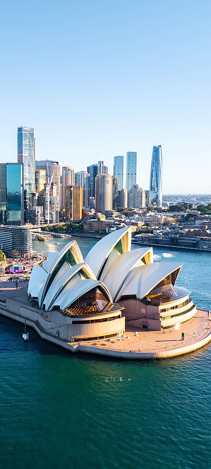 the iconic Sydney Opera House along with the surrounding cityscape of Sydney, Australia