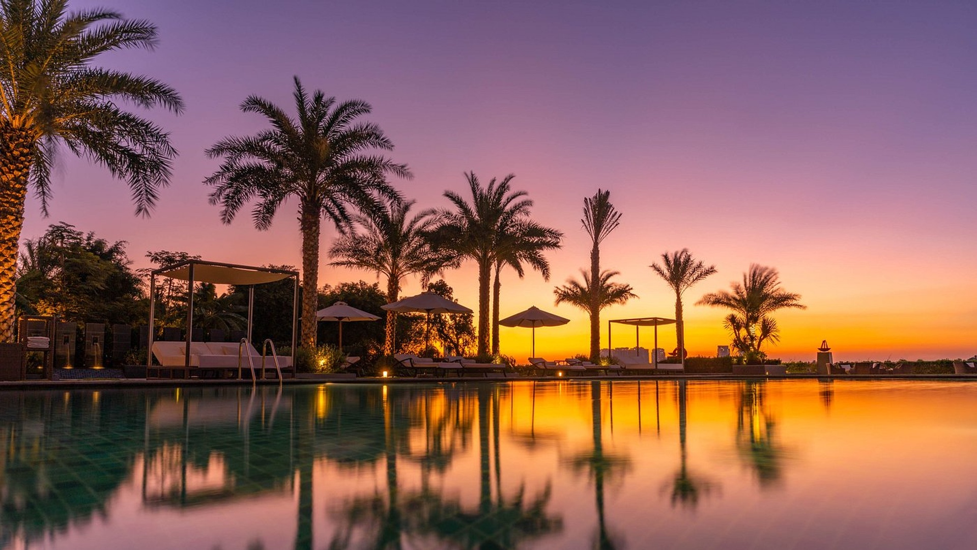 riverside pool area of the Mia Saigon – Luxury Boutique Hotel at sunset