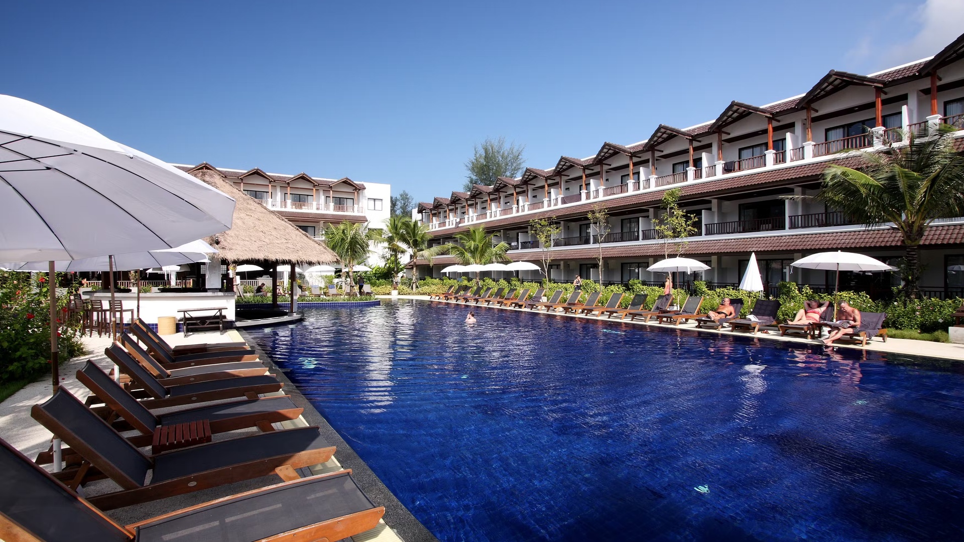 enjoy pool at Sunwing Kamala Beach resort