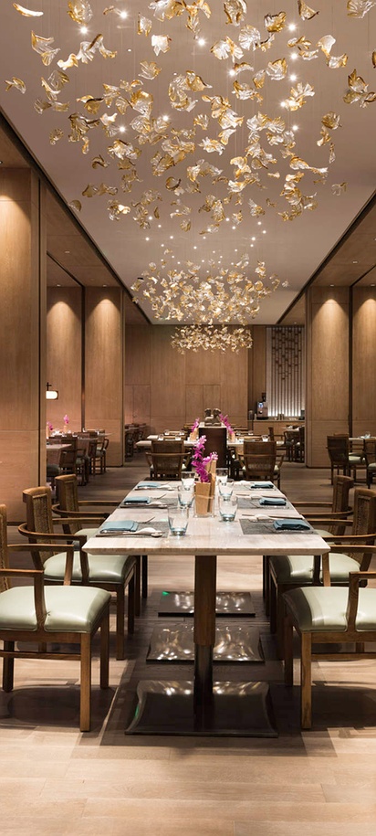 the interior of a restaurant located within the Novotel Shanghai Clover hotel in Shanghai, China