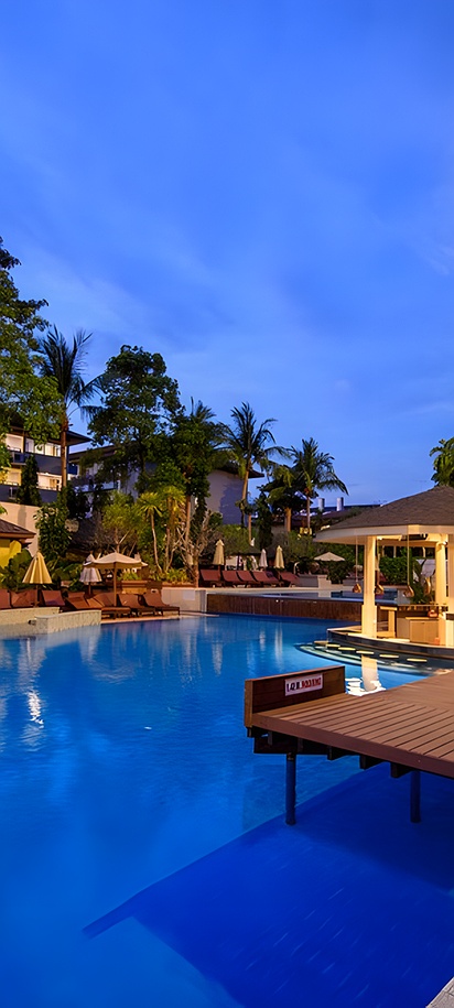 the Krabi La Playa Resort in Thailand, featuring its outdoor swimming pool area