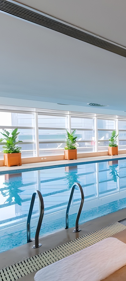 the indoor heated swimming pool at the Beijing Pudi Hotel in China