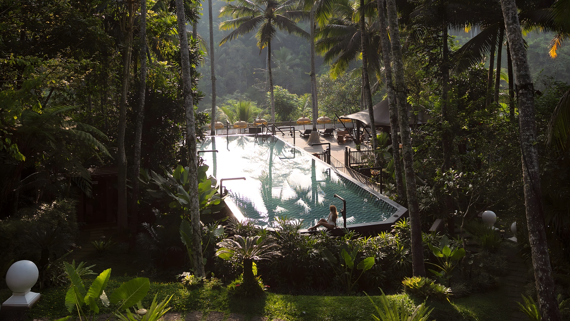 pool area of Capella Ubud resort in Bali, Indonesia 