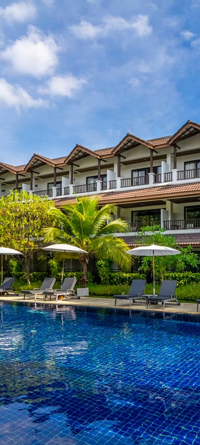 the pool area of the Kamala Beach Resort, a Sunprime Resort located in Phuket, Thailand