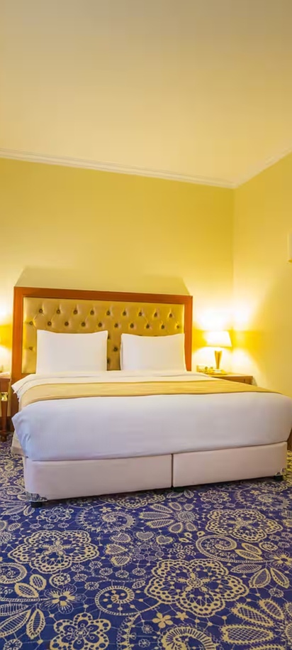 guestroom at the Ramada by Wyndham Almaty hotel