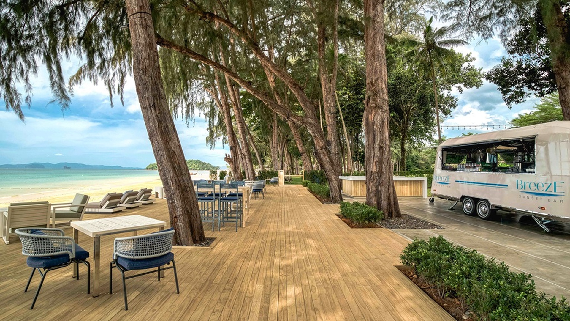 the outdoor seating area of the Breeze Beach Bar at the Dusit Thani Krabi Beach Resort