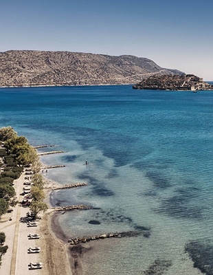 a serene moment on the beach of Domes of Elounda