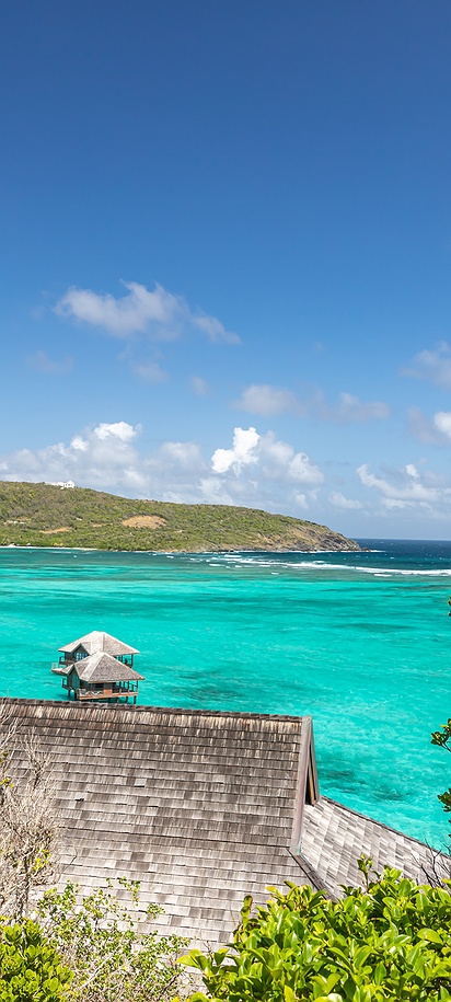 a scenic view of Canouan Island in Saint Vincent and the Grenadines