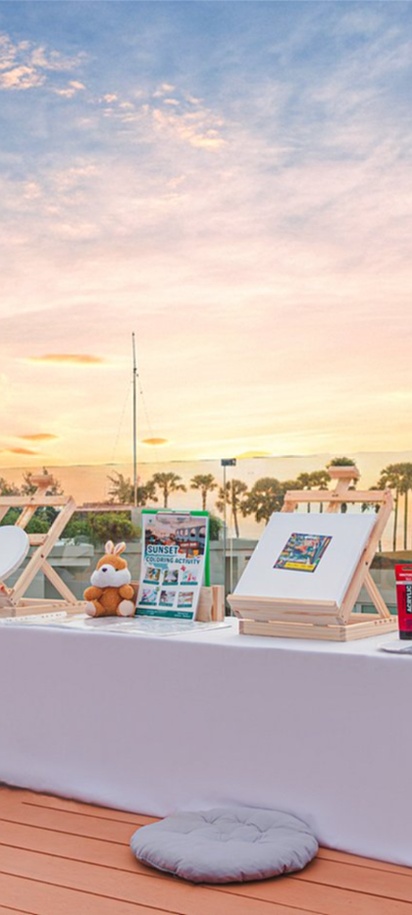 an outdoor setup for a beach wedding reception or special event at a resort in Phuket, Thailand