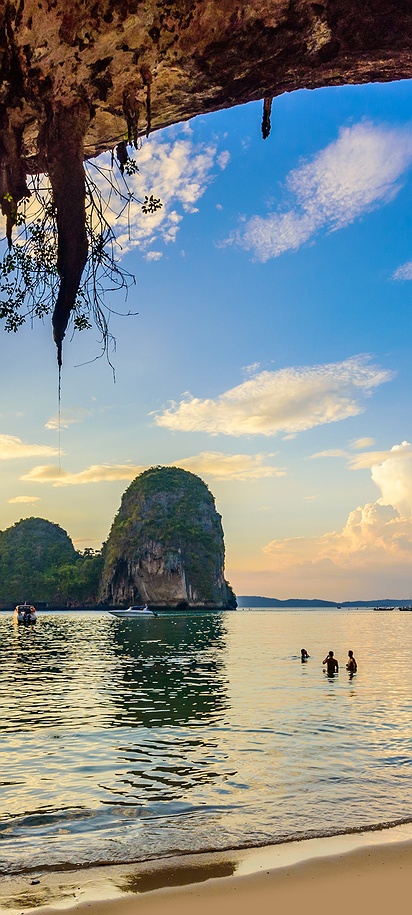 a scenic sunset view from a cave at Phra Nang Cave Beach in Krabi, Thailand