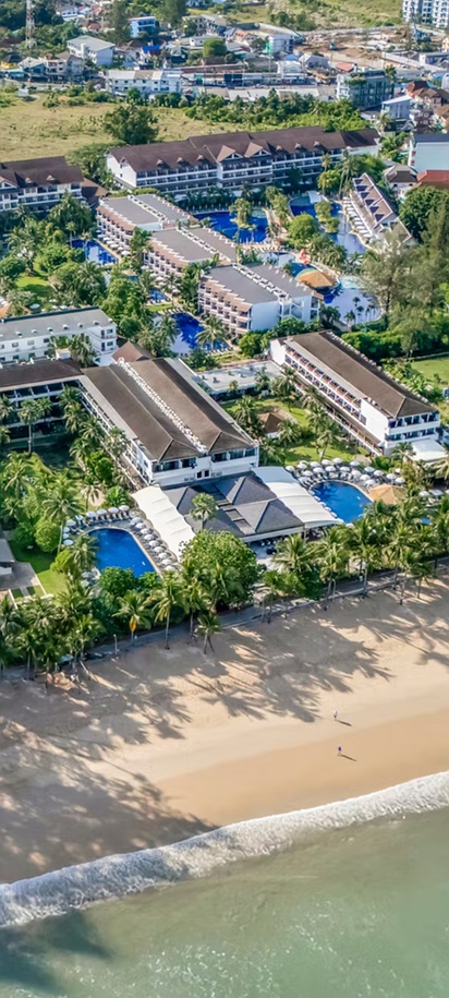 an aerial view of the Sunprime Kamala Beach resort located in Phuket, Thailand