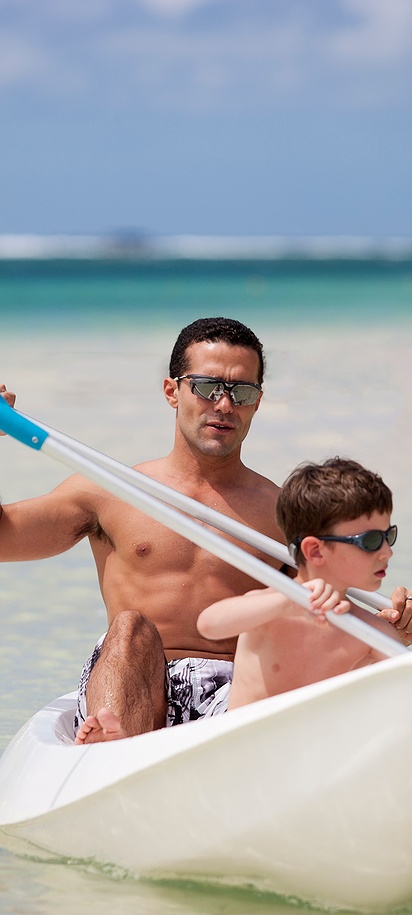 a recreational kayak in the calm, turquoise waters of a tropical destination in Mauritius