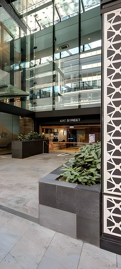 the exterior entrance of the Vibe Hotel North Sydney