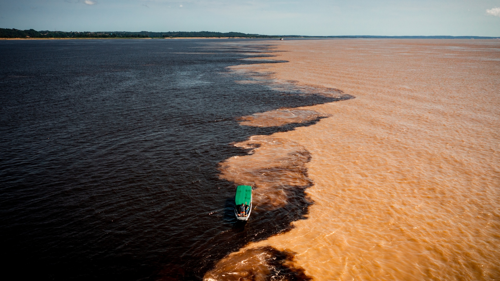 Meeting of Waters" (Encontro das Águas) near Manaus, Brazil