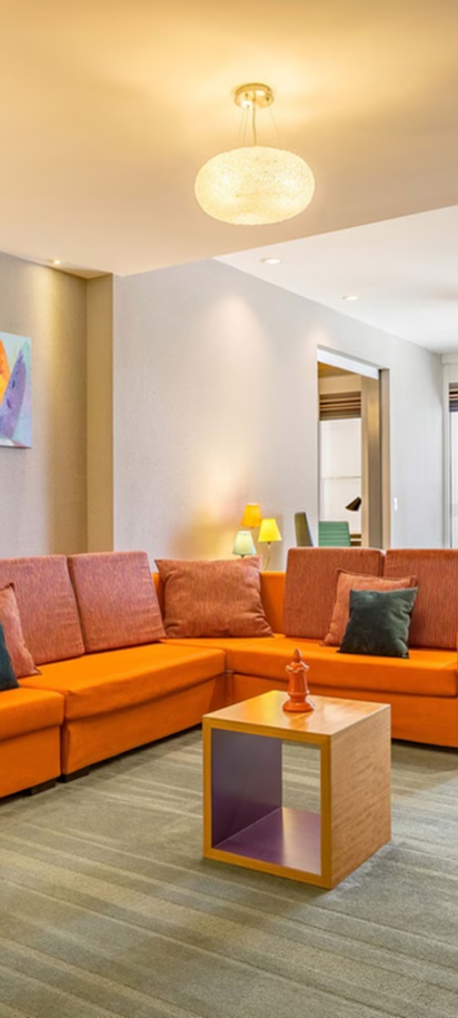 a modern guest room at the Aloft Panama hotel