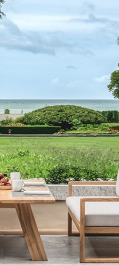 This outdoor dining set is located at the Dusit Thani Krabi Beach Resort in Krabi, Thailand.