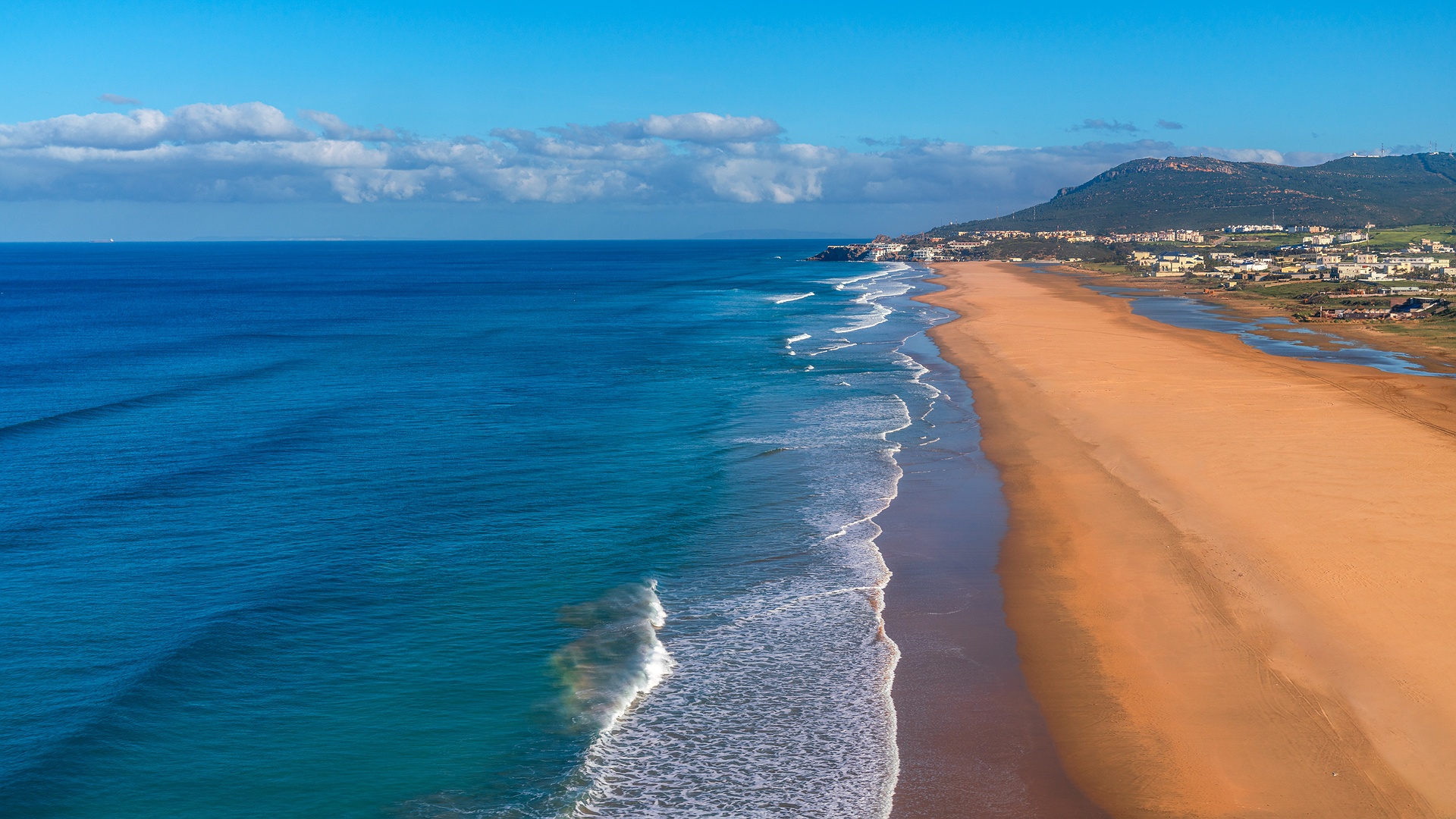 beautiful sandy beach on the Atlantic coast near Tangier, Morocco.