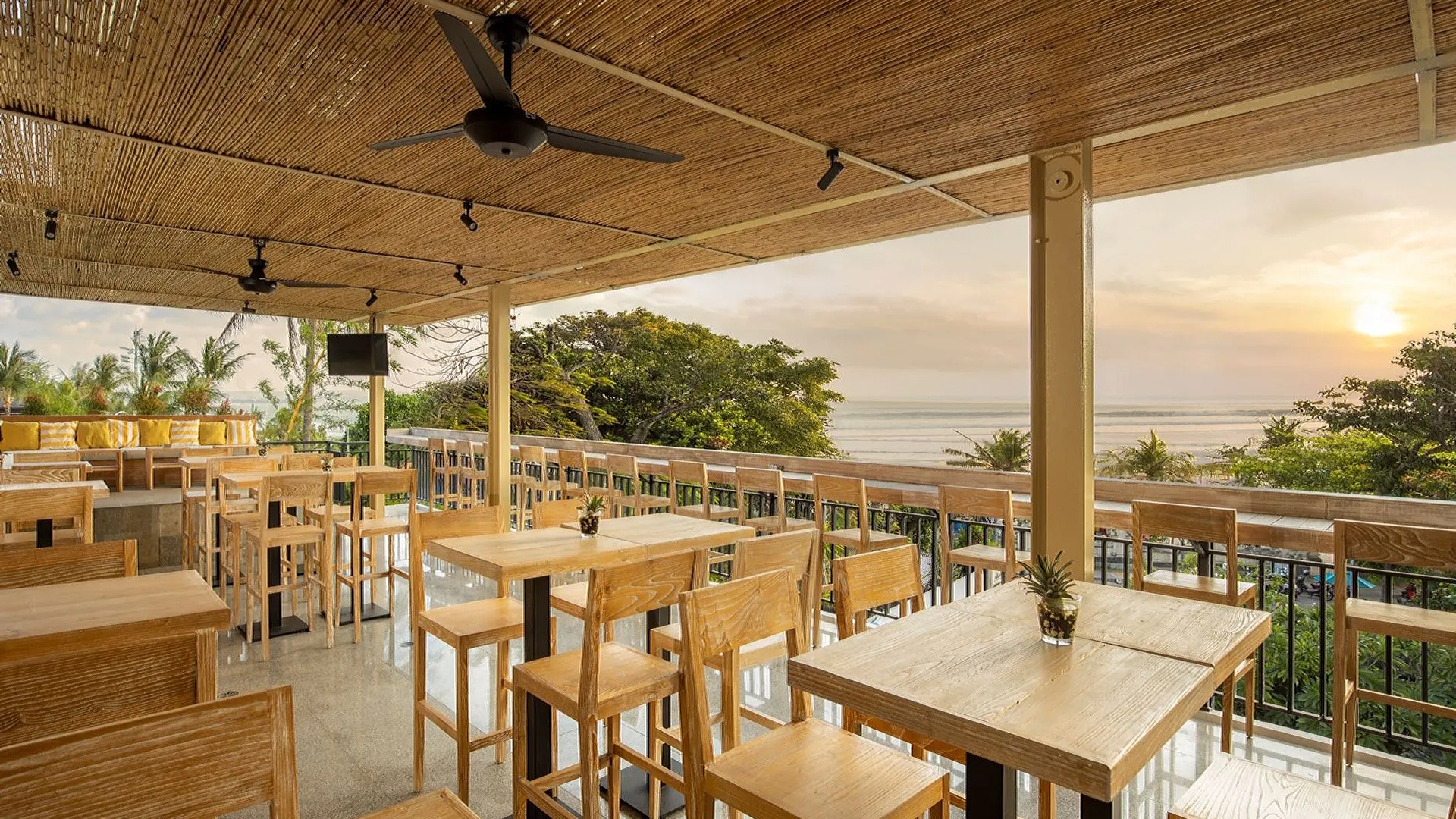 the Tao Beach House restaurant and bar located at the Away Bali Legian Camakila Resort in Bali