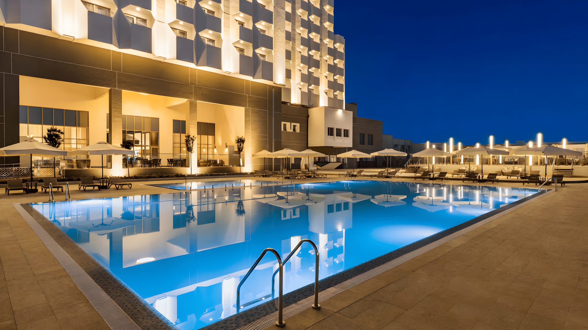 outdoor swimming pool at the Wyndham Bukhara hotel in Bukhara, Uzbekistan