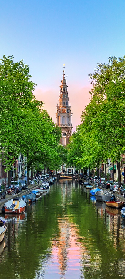 a scenic view of the picturesque canals of Amsterdam in the Netherlands