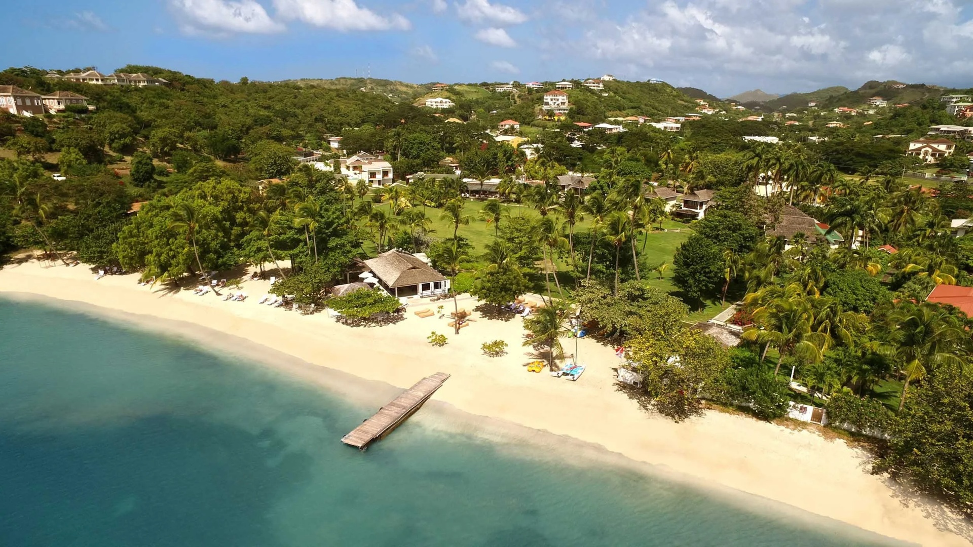 an aerial view of the Calabash Luxury Boutique Hotel located on Prickly Bay in Grenada. 