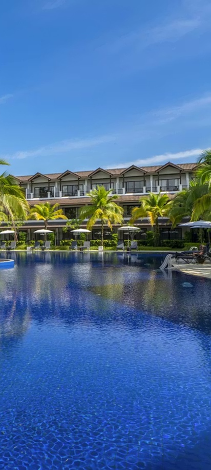 a swimming pool at the Sunprime Kamala Beach resort in Thailand.