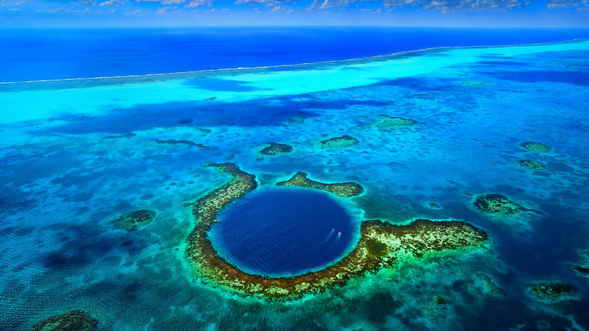 the Great Blue Hole, a massive underwater sinkhole located off the coast of Belize
