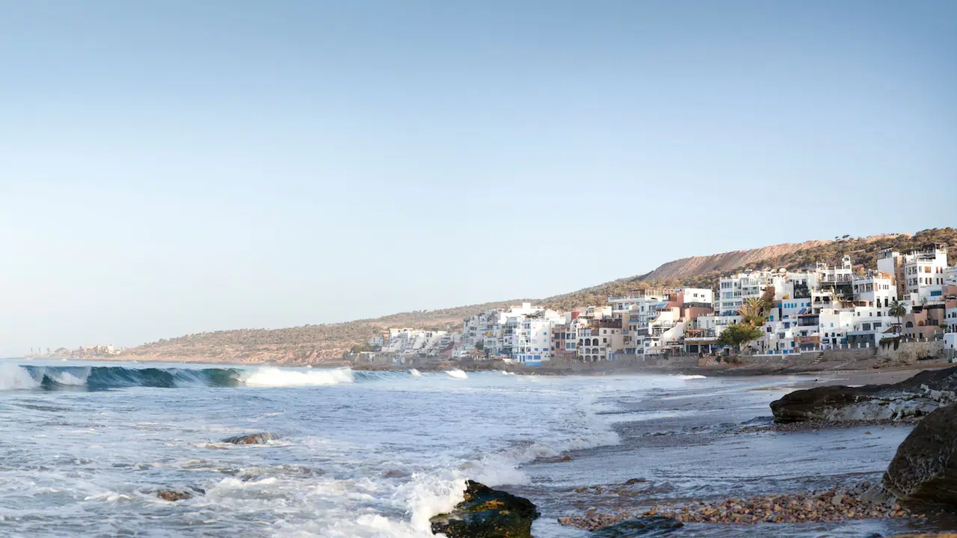 a scenic view of the coastal village of Taghazout in Morocco