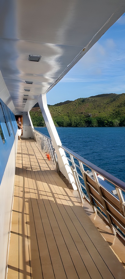 the deck of the M/Y Pegasos, a 45-meter twin-hulled mega yacht operated by Variety Cruises