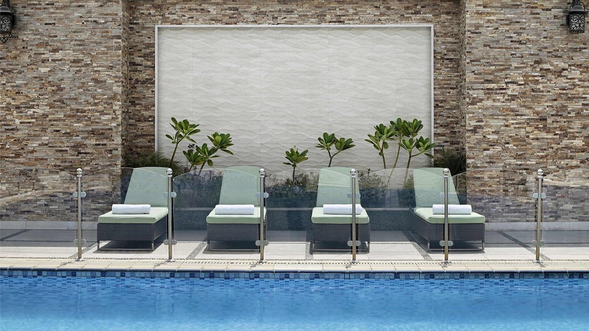 swimming pool area at the Mövenpick Hotel City Star Jeddah