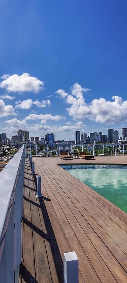 the rooftop pool area of the Novotel Salvador Rio Vermelho hotel in Salvador, Brazil