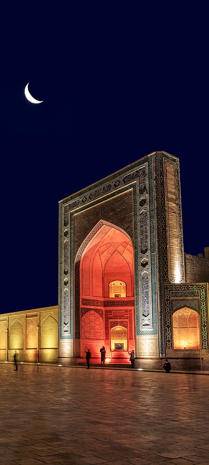 the Po-i-Kalyan ensemble in Bukhara, Uzbekistan, at night