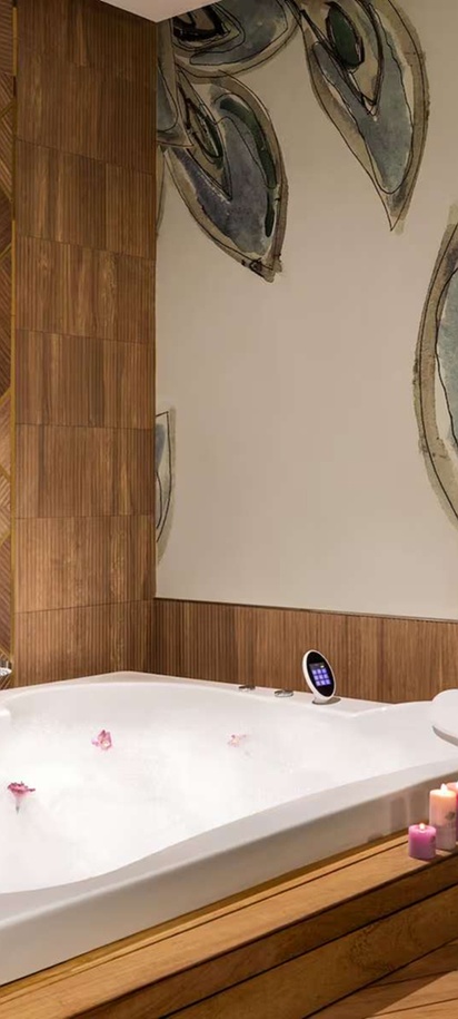 relaxing bathroom scene inside a guest room at the Wyndham Bukhara hotel