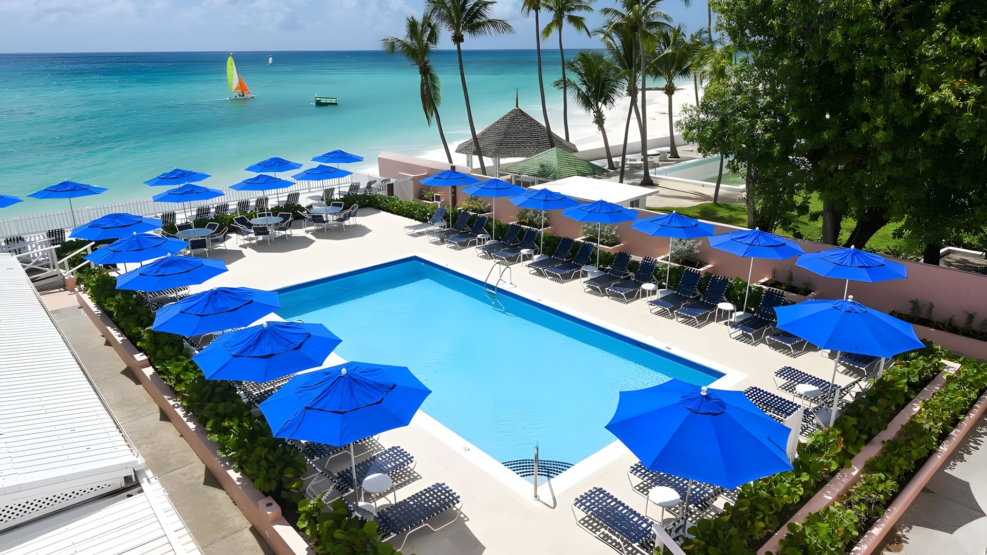 the swimming pool area at the Butterfly Beach Hotel in Barbados
