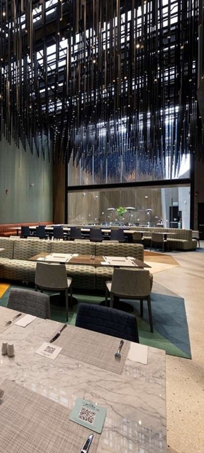 the interior dining area of the Hilton Garden Inn Lima Miraflores hotel in Peru