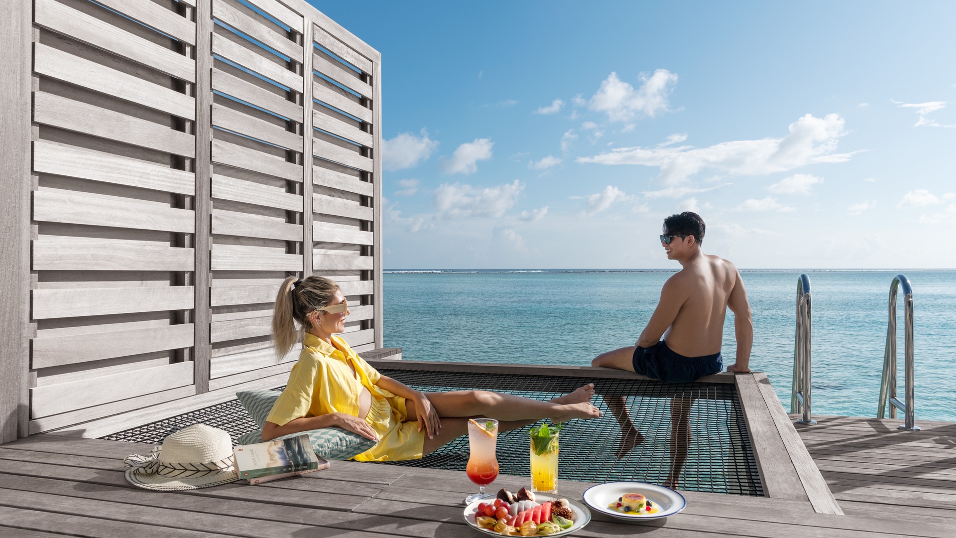 Sunrise Overwater Villa with hammock