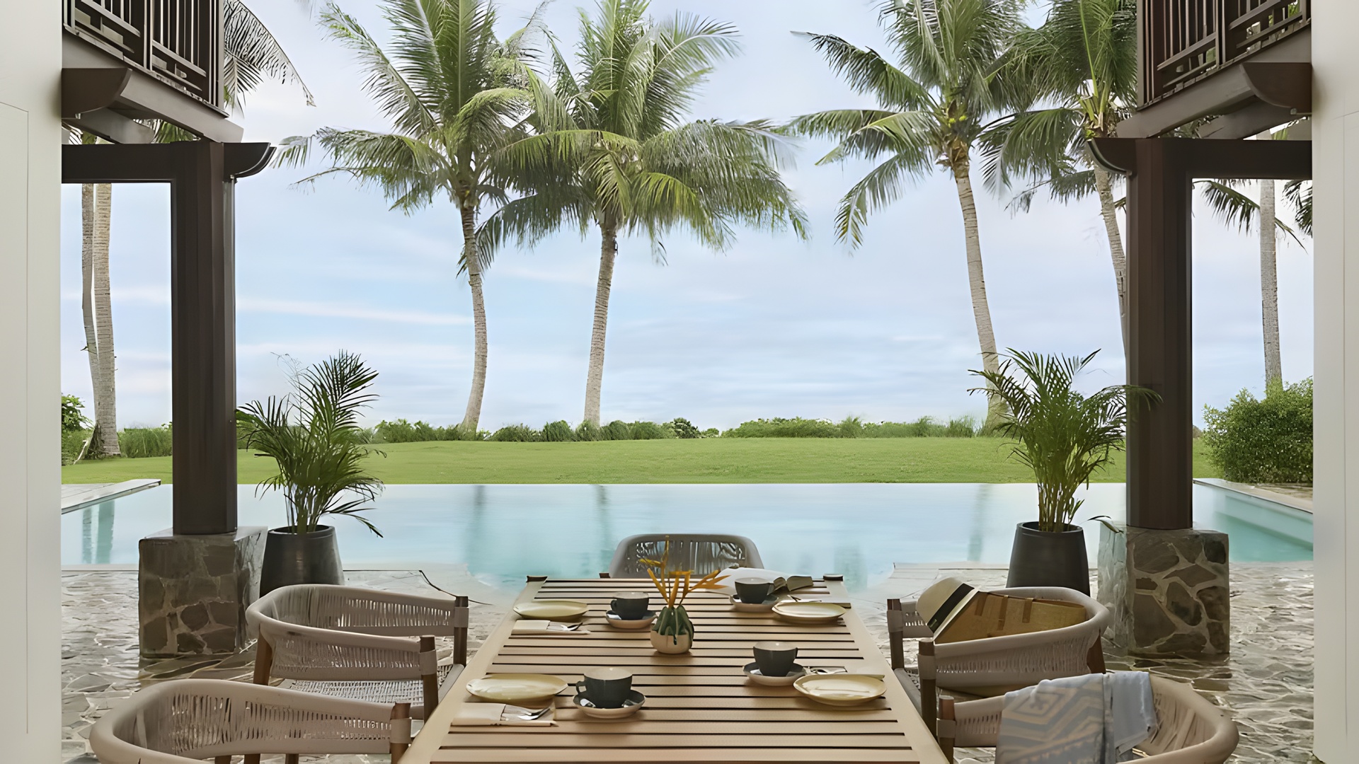  a luxurious beachfront dining area, a villa pavilion, at the Barceló Coconut Island resort in Phuket, Thailand. 