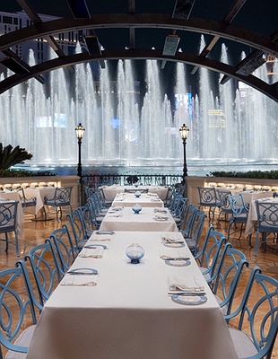 Exterior view with fountain show at Bellagio Hotel and Casino