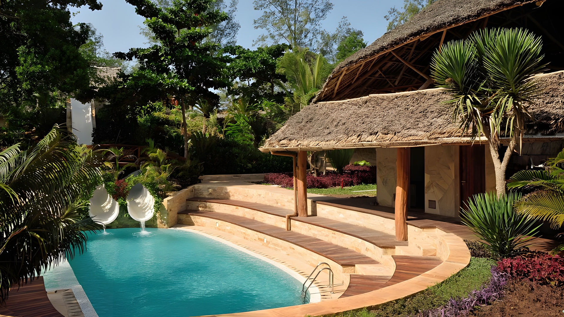 swimming pool area at the Tulia Zanzibar Unique Beach Resort