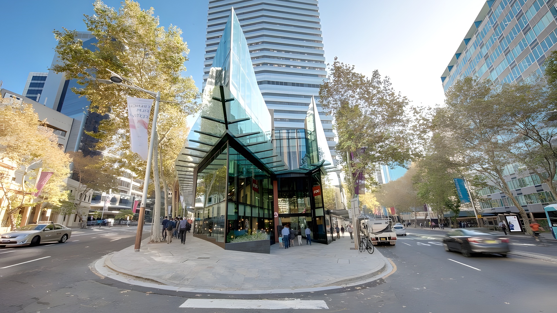 the exterior of the Vibe Hotel North Sydney located on the Pacific Highway