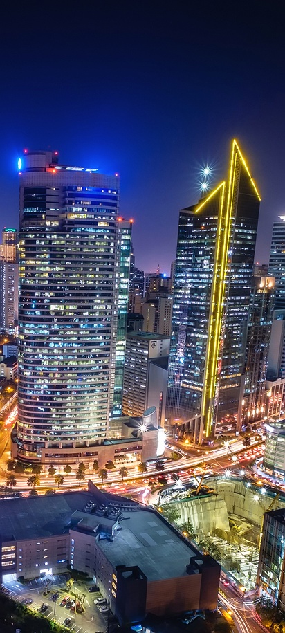 a night view of the Makati City skyline in the Philippines