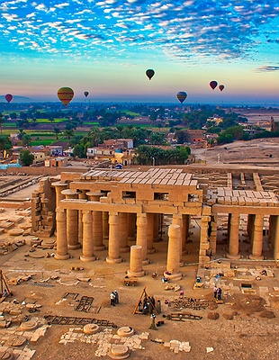 a scenic view of the Luxor Temple complex situated on the east bank of the Nile River in Luxor, Egypt