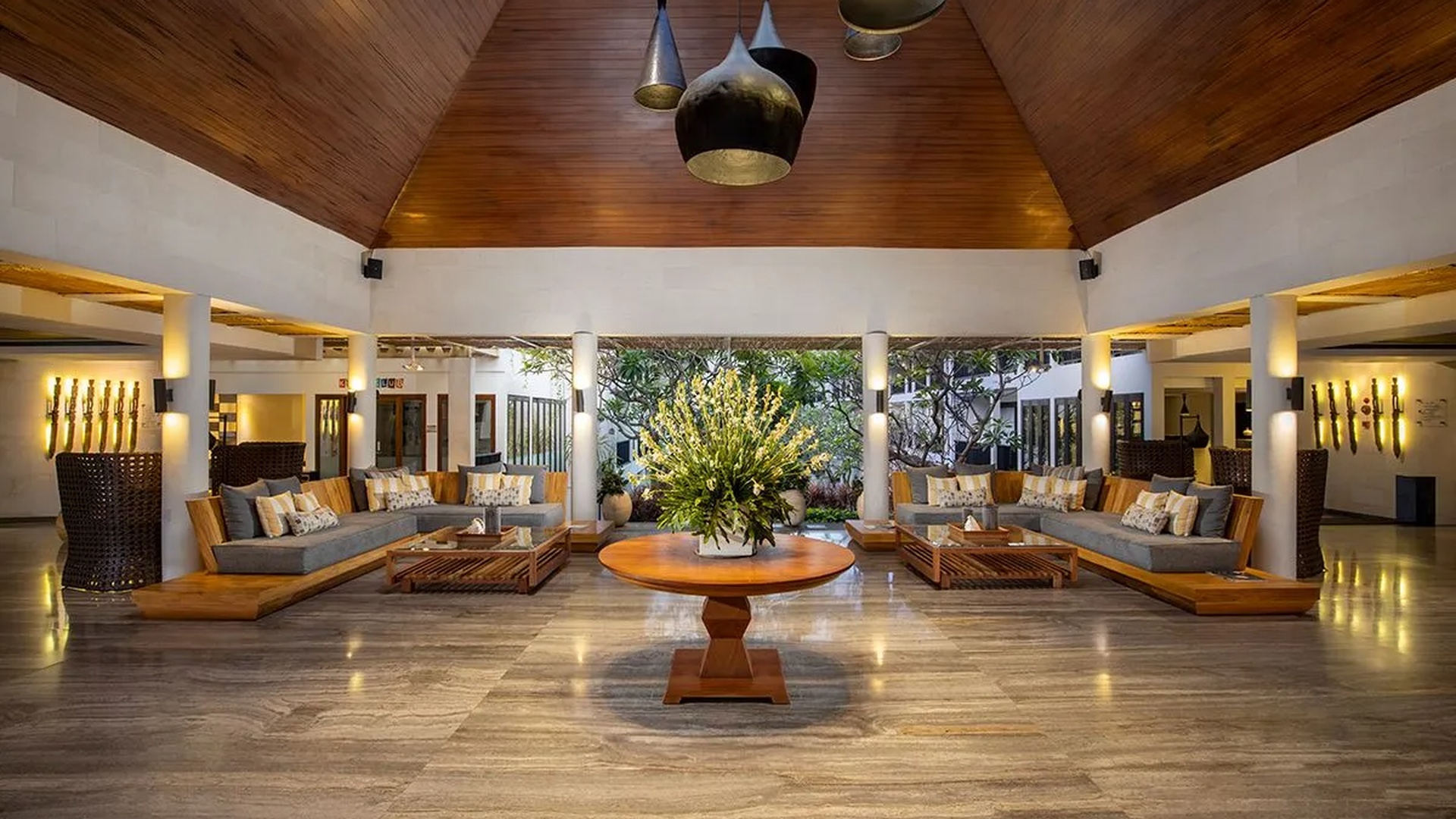 the lobby area of the Away Bali Legian Camakila resort in Bali, Indonesia