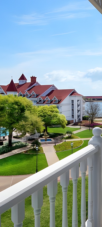 a balcony overlooking the grounds and pool area at Disney's Grand Floridian Resort & Spa in Lake Buena Vista, Florida.