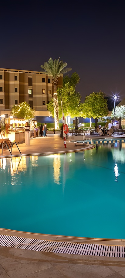 the luxurious pool area and exterior of the InterContinental Riyadh hotel in Saudi Arabia
