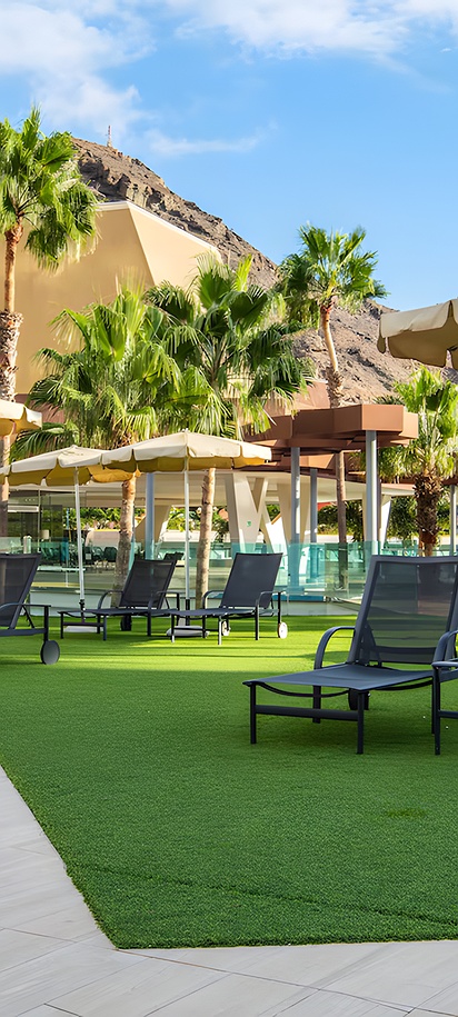 sunny lounge area with sun loungers and umbrellas at the Radisson Blu Resort & Spa, Gran Canaria Mogan