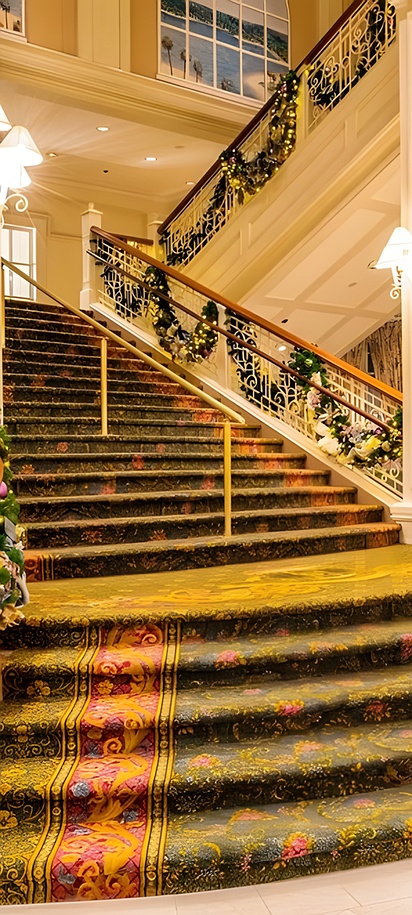 the lobby staircase of Disney's Grand Floridian Resort & Spa, a luxury Victorian-style resort located in Walt Disney World, Florida