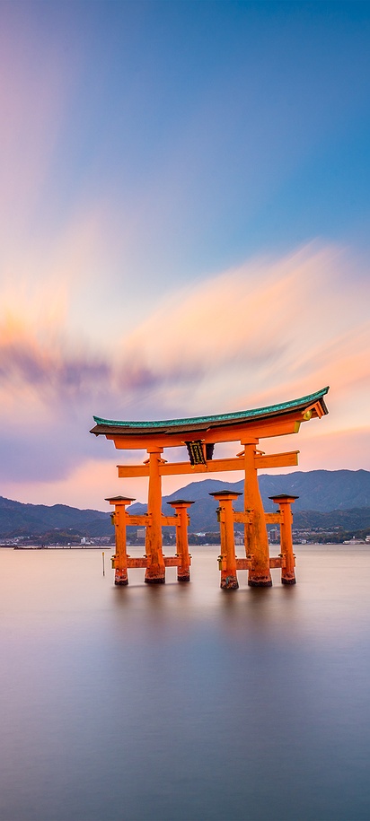 the iconic "floating" Great Torii Gate of the Itsukushima Shrine located on Miyajima Island in Japan